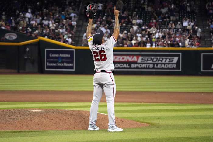 Jun 3, 2023; Phoenix, Arizona, USA; Atlanta Braves relief pitcher Raisel Iglesias (26) celebrates after defeating the Arizona Diamondbacks at Chase Field.